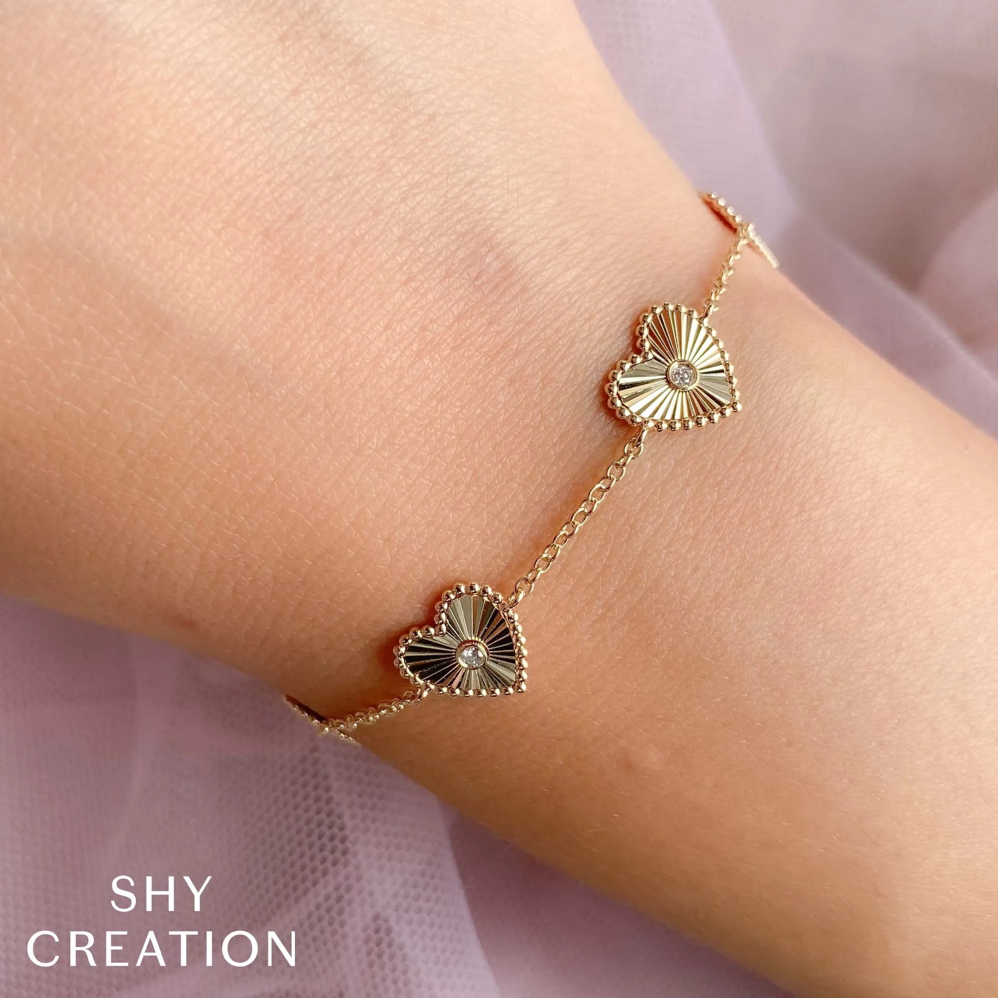 0.10CT DIAMOND BEZEL HEART BRACELET