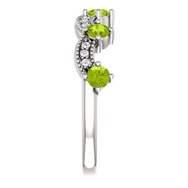 14KT GOLD 0.65 CTW PERIDOT & 0.06 CTW DIAMOND ACCENT CROWN RING