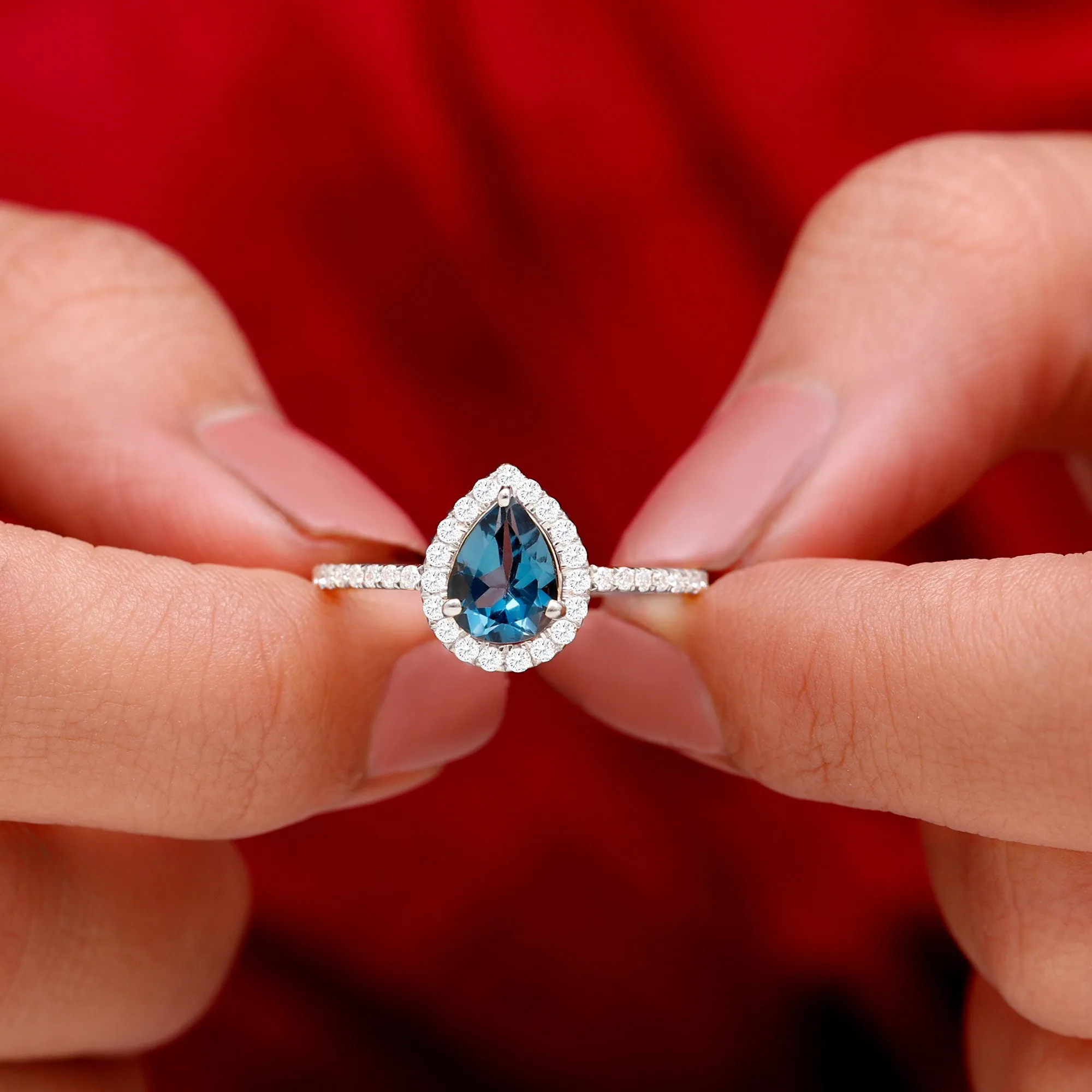 1.5 CT Teardrop London Blue Topaz Ring with Moissanite Halo