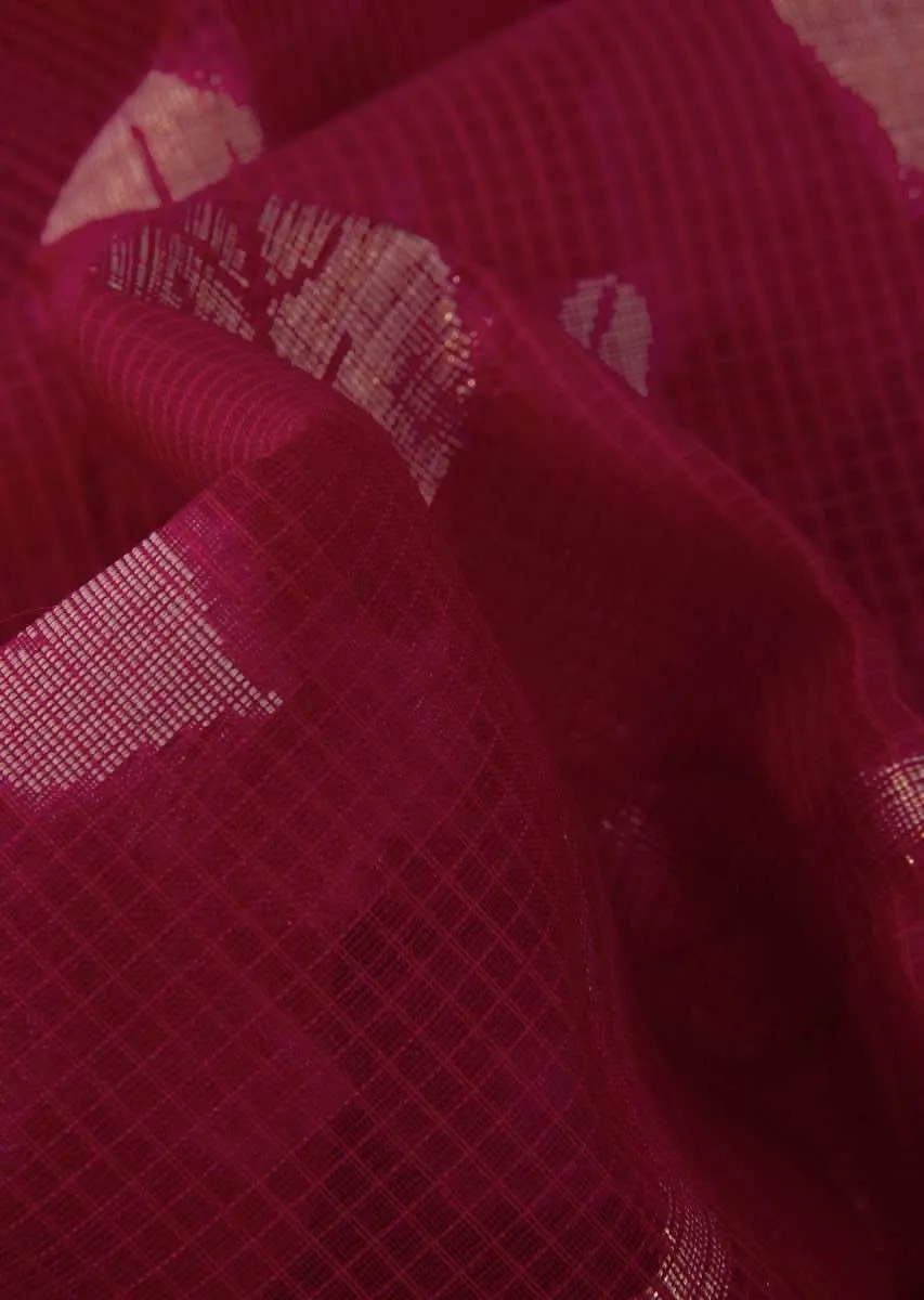 Coral red tussar silk saree with weaved work in floral motif only on Kalki