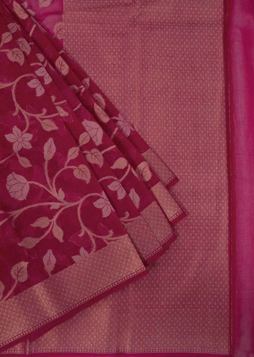 Coral red tussar silk saree with weaved work in floral motif only on Kalki