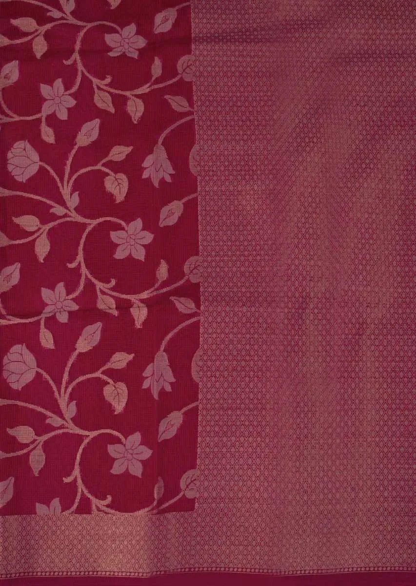Coral red tussar silk saree with weaved work in floral motif only on Kalki