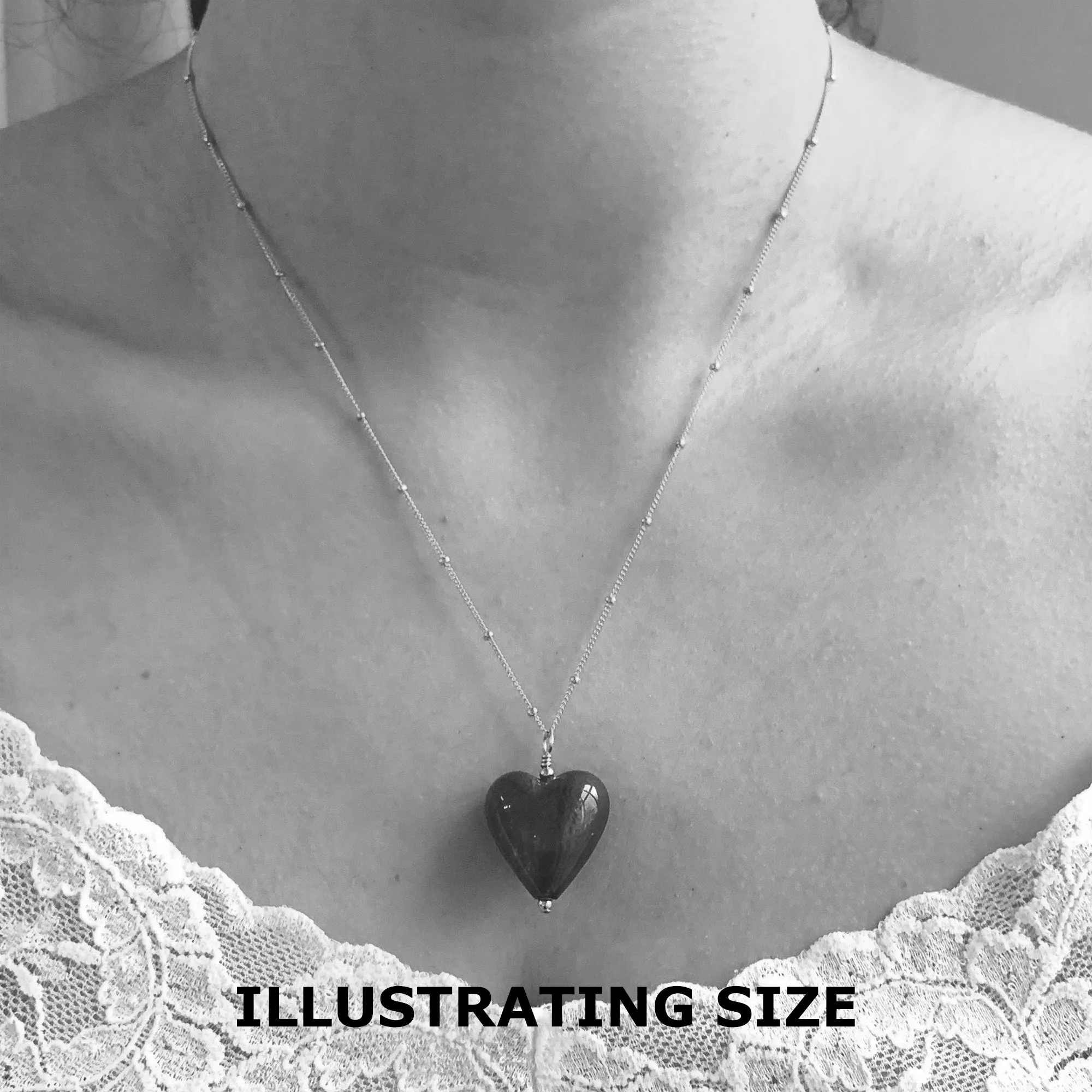 Necklace with black spiral and gold Murano glass medium heart pendant on gold chain
