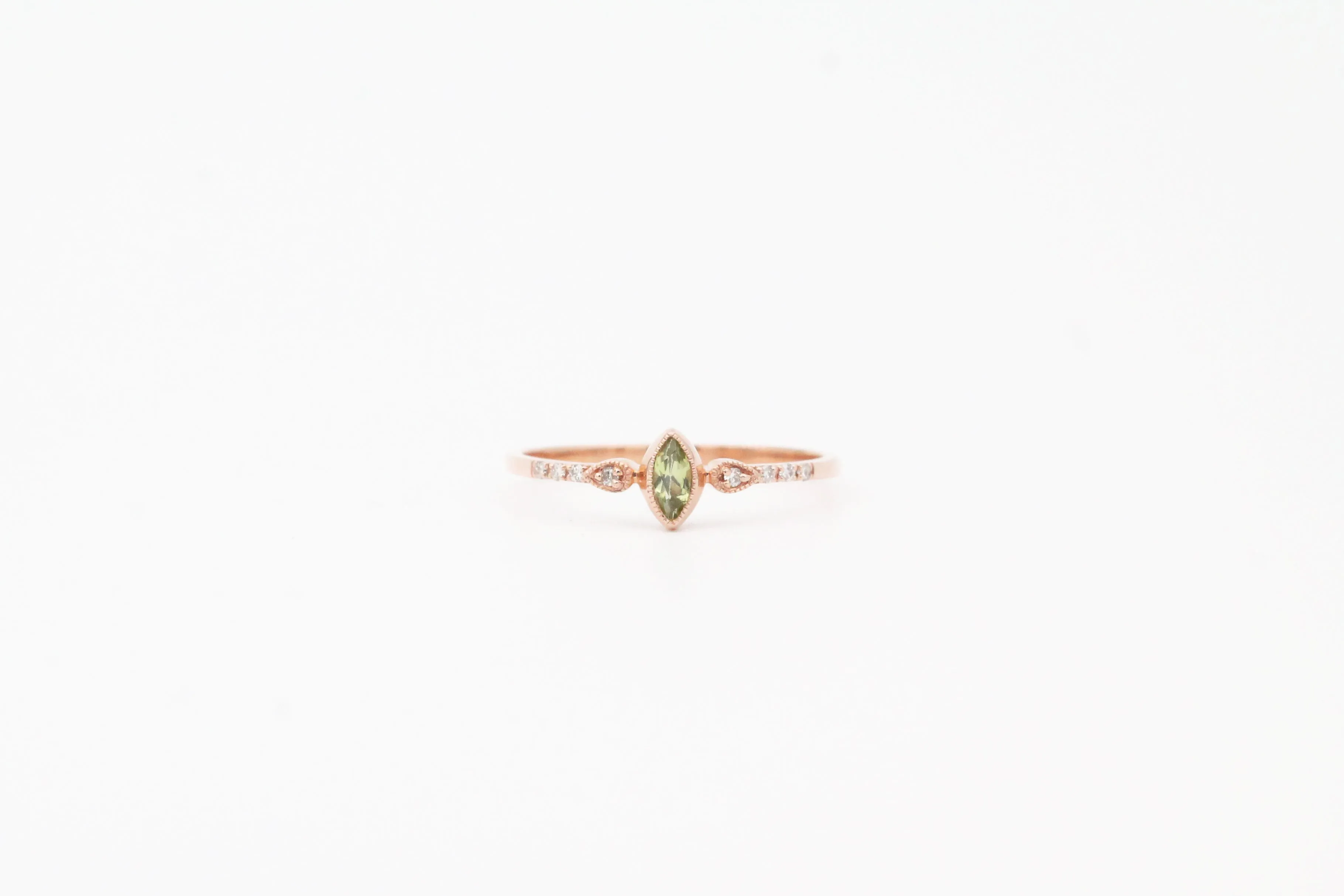 Rose Gold Marquise Cut Bezel Set Peridot and Diamond Ring
